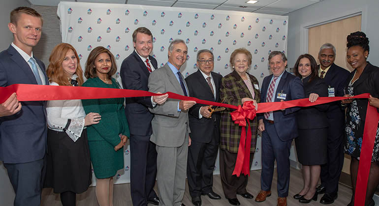 Brooklyn Infusion Center team cutting ribbon