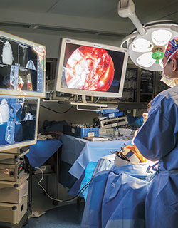 Image of Alfred Marc Iloreta, MD, performing a transnasal endoscopic surgery