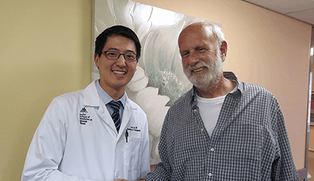 Dr. Fred Lin with patient