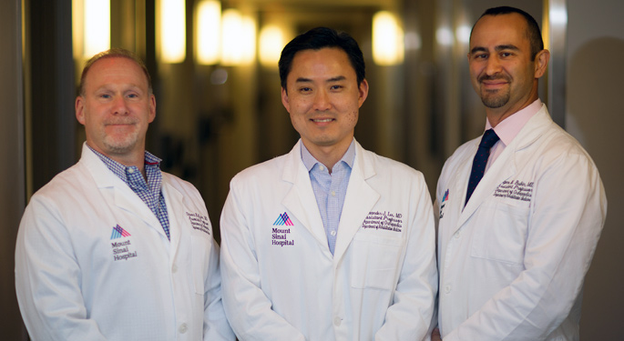 Group image of spine physiatry Drs. Eugene Bulkin, Alexander Lee, and Stuart Kahns
