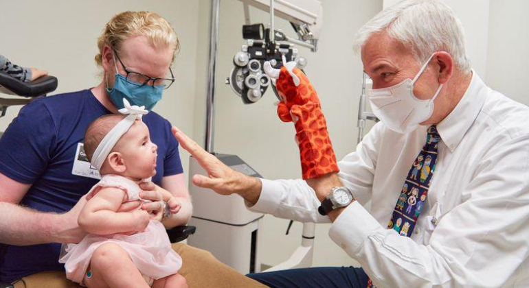 Image of doctor treating patient