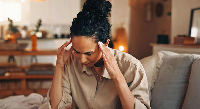 Image of woman with a headache
