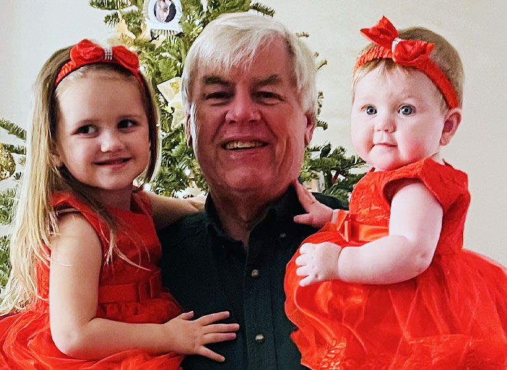 Photo of Robert Kehoe with two granddaughters