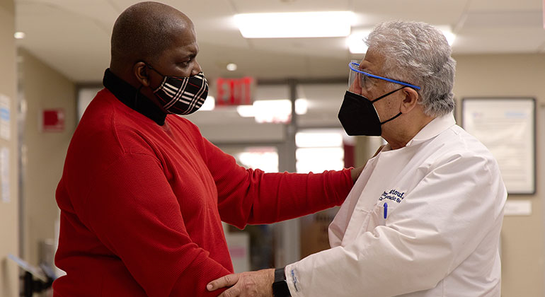 Image of doctor with patient
