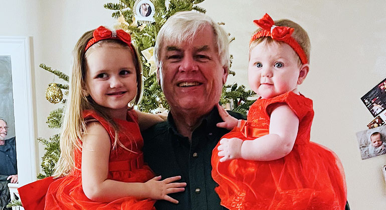 Robert Kehoe with two granddaughters