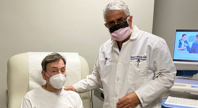 Heart patient Doug Robertson patient with Dr. Omar Lattouf