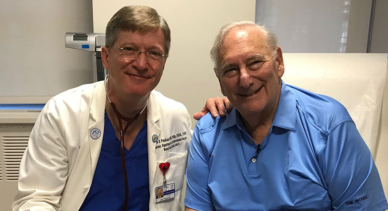 Image of Verissimo Costa with doctor John Puskas