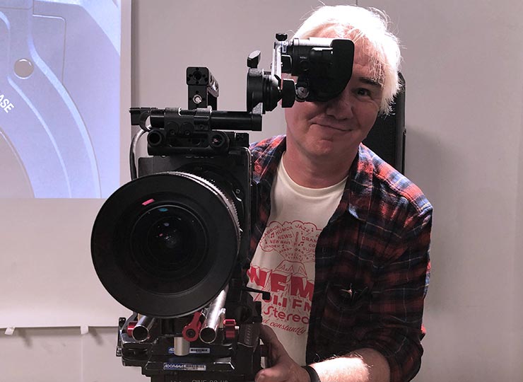 Photo of Patient behind a film camera