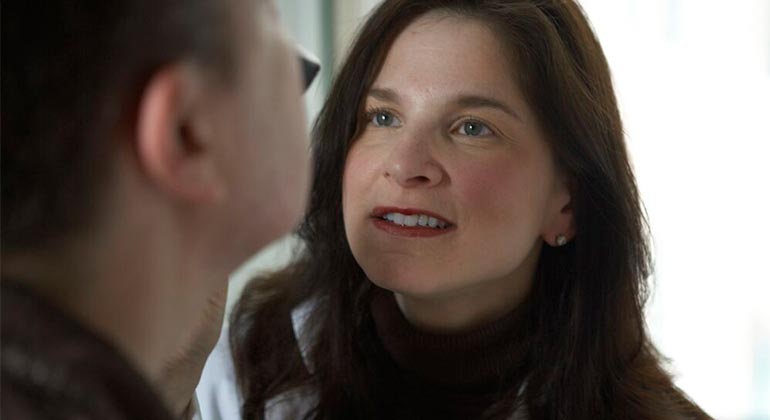 Doctor talking to a patient. 