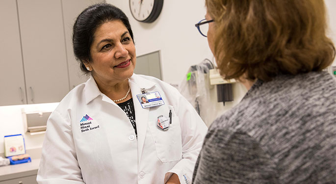 Photo of doctor and patient talking