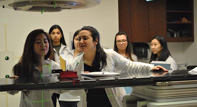 Image of doctor scanning a patient