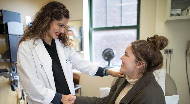 Image of Doctor with patient