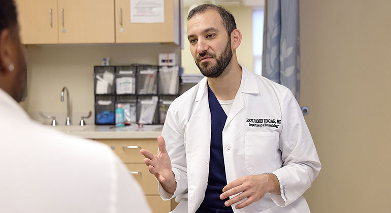 Image of doctor with patient