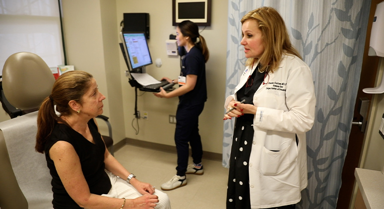 Dr. Guttman with patient