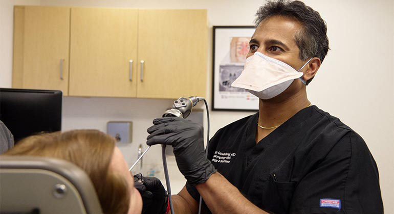 Dr. Govindaraj scoping a patient