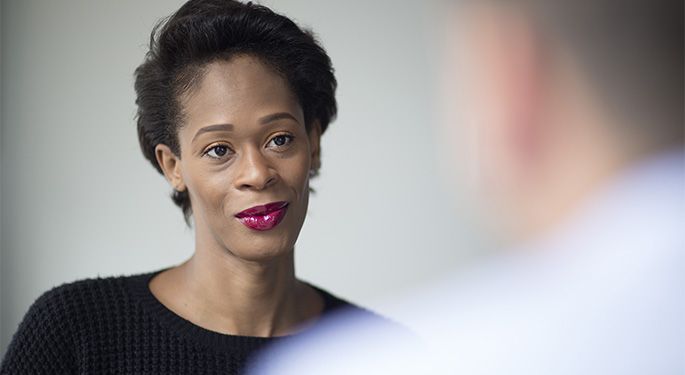 A transgender patient meeting with a doctor from the Center for Transgender Medicine