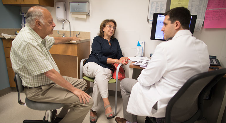 Dr. Benjamin Cohen discussing a patient’s case