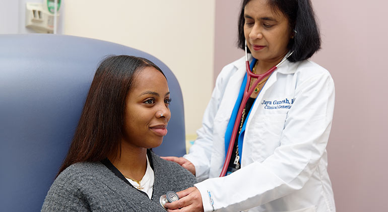 doctor checking patient