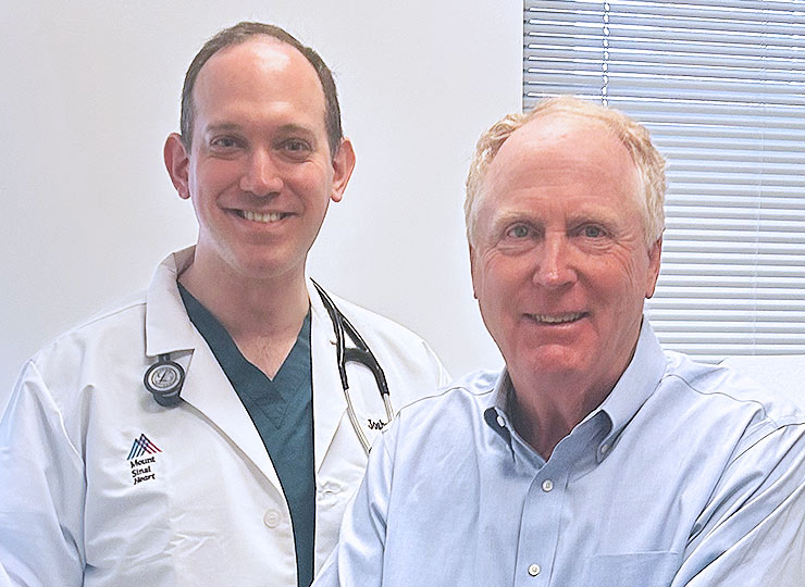 Photo of Jim Small and doctor Joshua Lampert