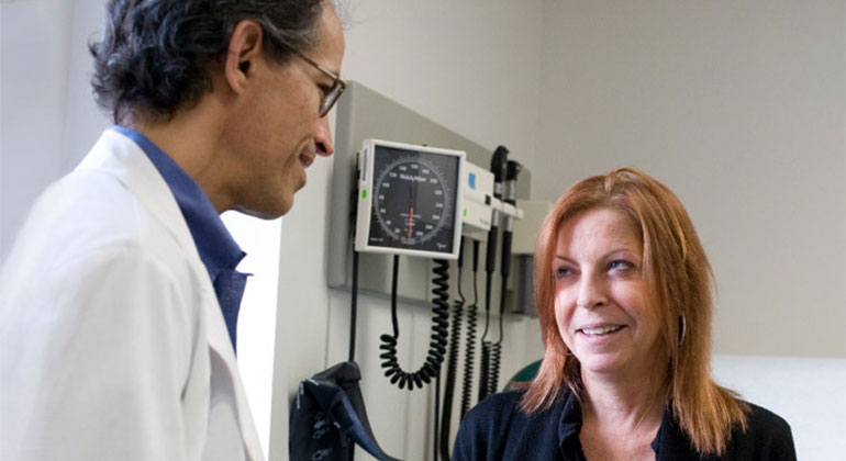 Doctor talking to patient