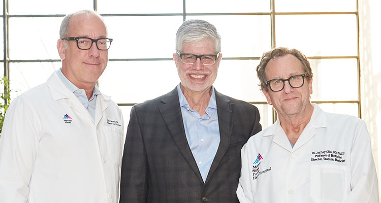 group shot of patient Nicholas Pisano with his doctors