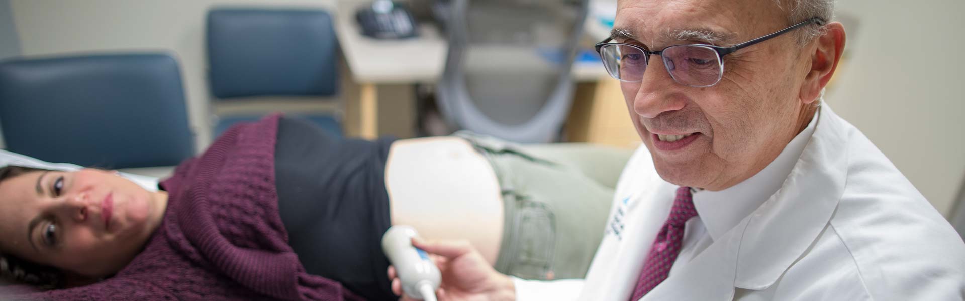 Doctor examining female patient