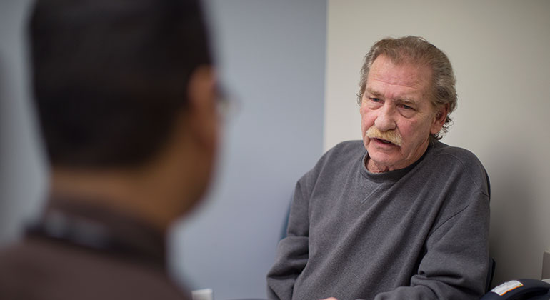 Doctor talking to patient