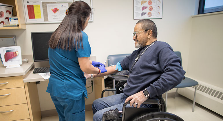 Image of nurse with male patient