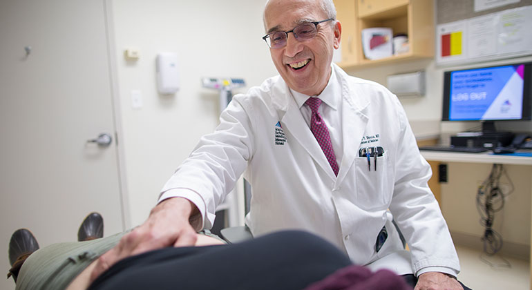 Image of doctor examining patient