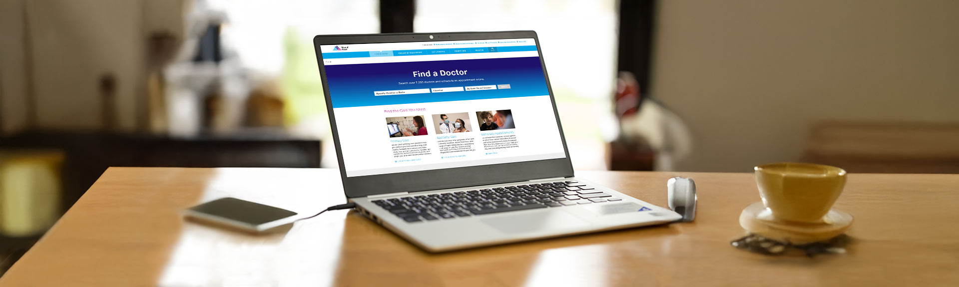 image of laptop with find a doctor landing page