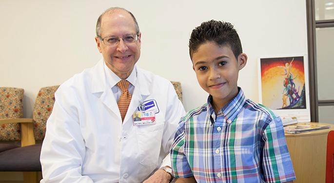 Image of Dr. Walter Molofsky with child at Pediatric Neurology