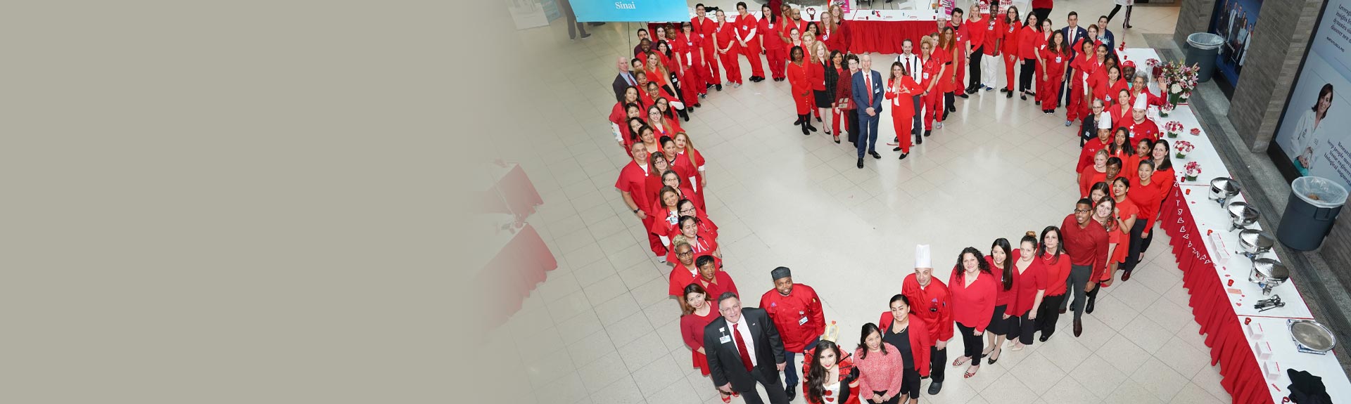 People forming a heart