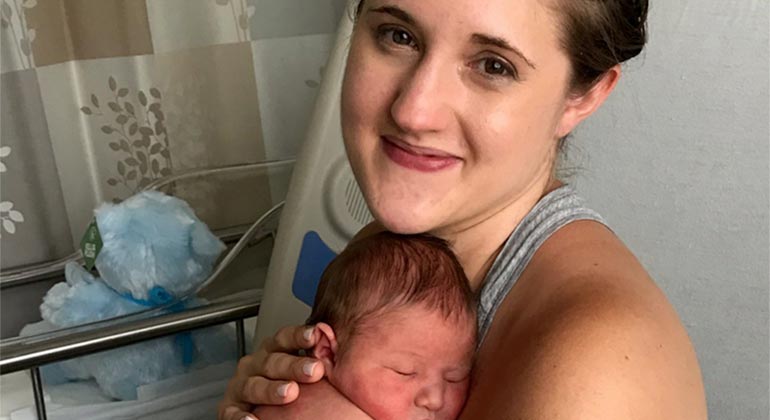 Image of mother holding baby