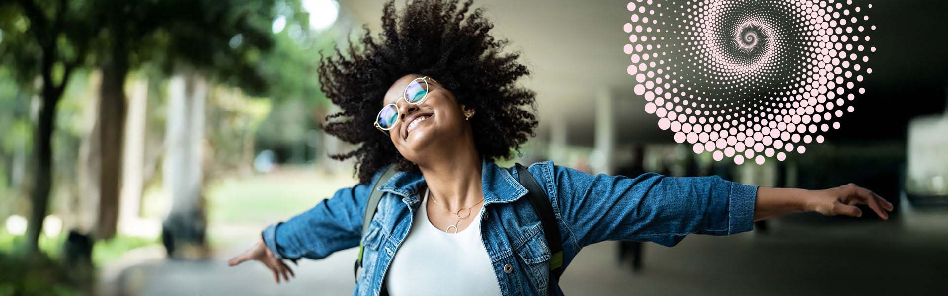 Woman smiling outside of building
