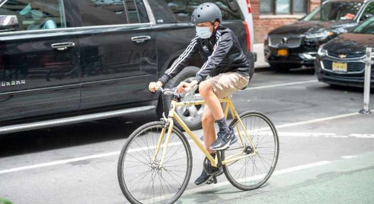 individual traveling on a bike