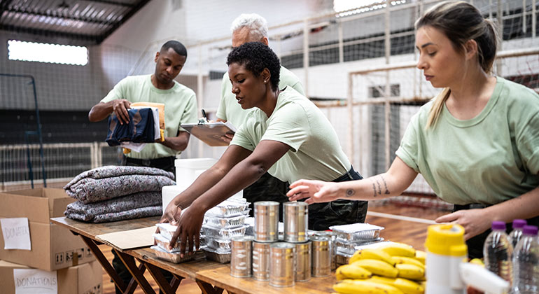 people organizing goods