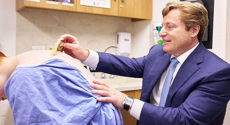 doctor treating patient 