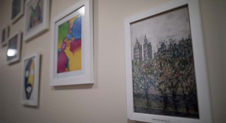 Framed photos on a wall