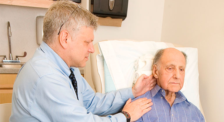 Doctor performing massage