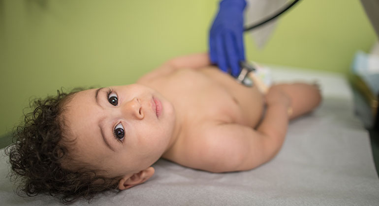 Newborn on a table