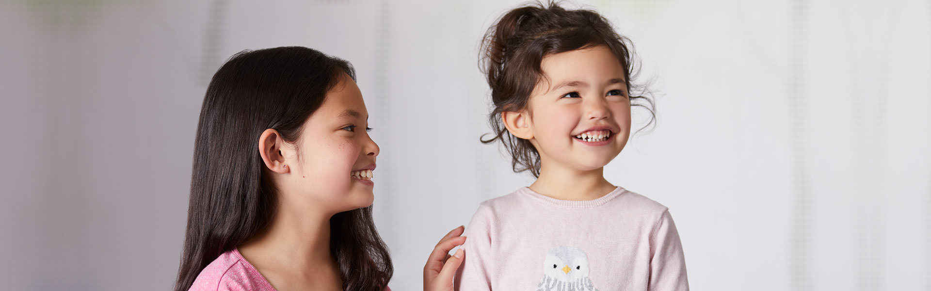 Image of two girls laughing