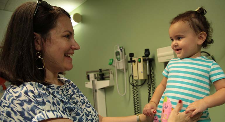 Doctor with pediatric patient