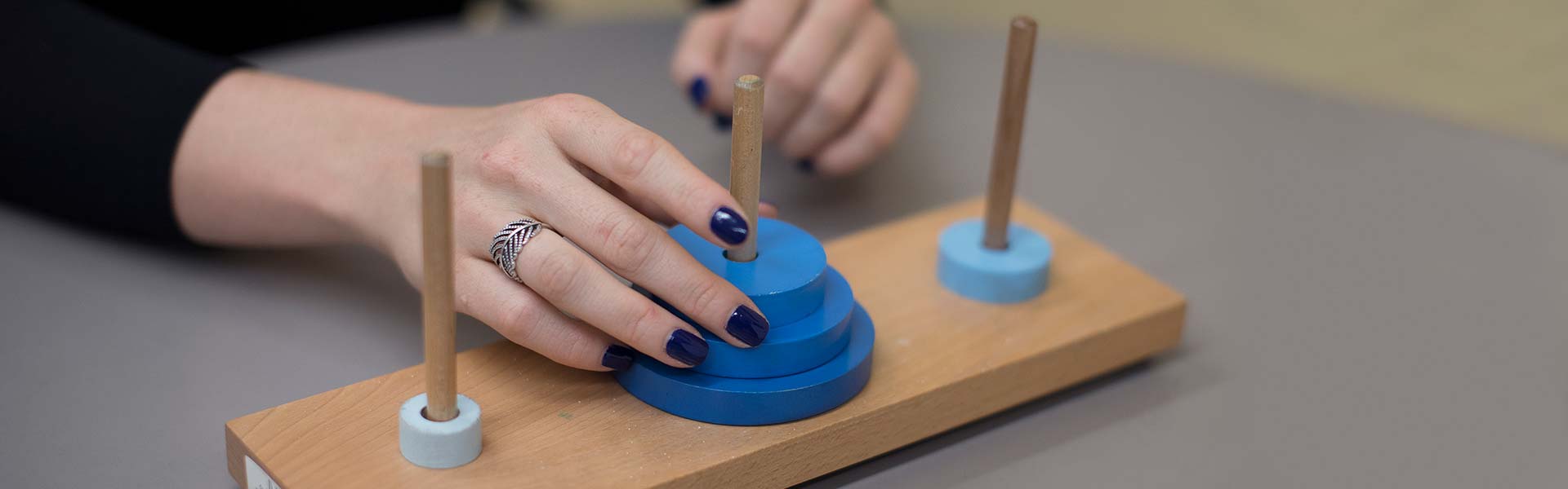 Doctor with a wooden post and circle game