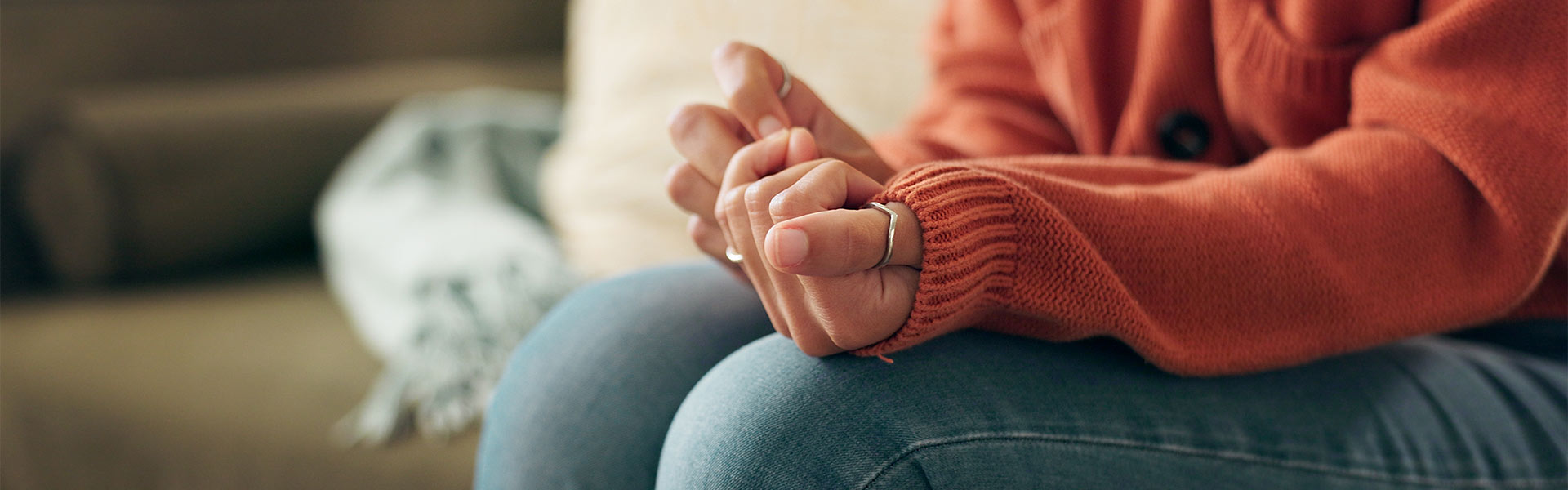 person holding hand in lap