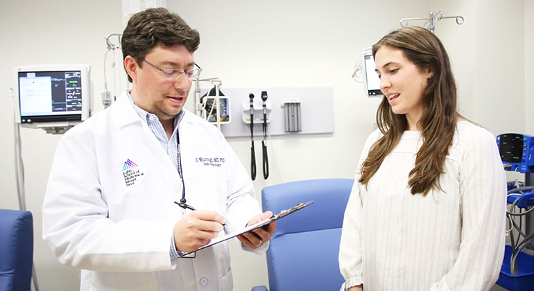 Image of doctor and female patient