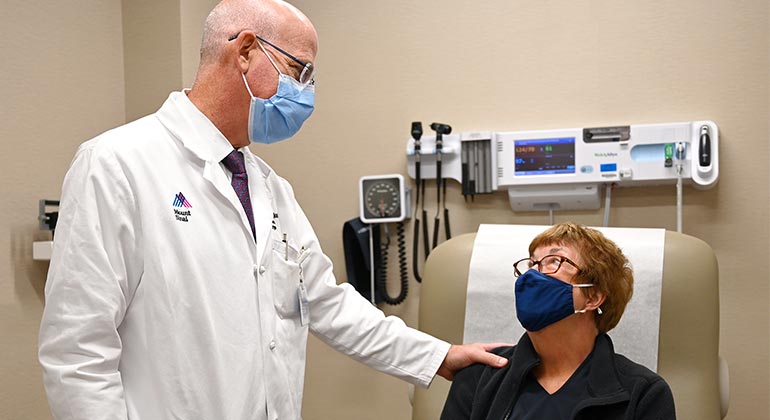 image of physician and patient