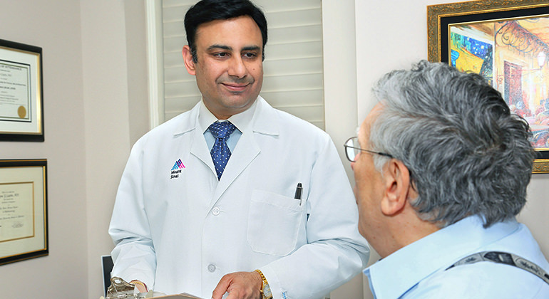 Doctor Gupta with patient