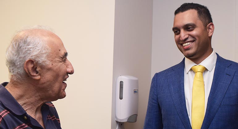 Image of doctor talking to patient