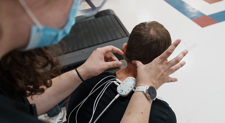 Image of doctor treating patient