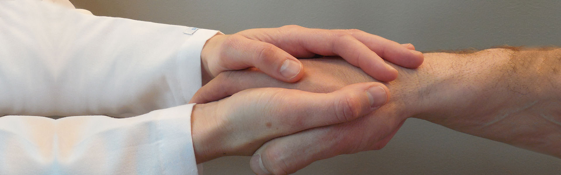 Image of doctor and patient shaking hands
